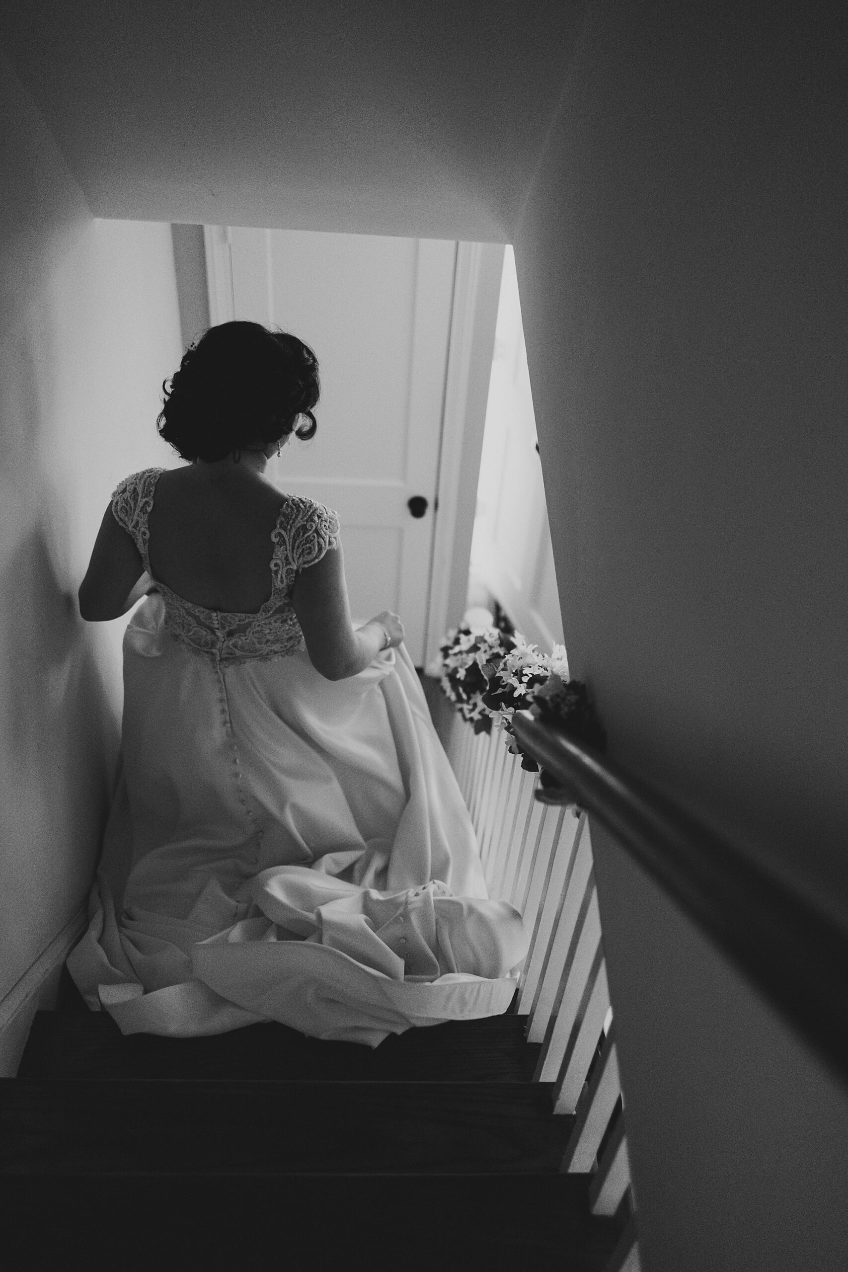 bride walk down staircase inside Appleford Estate