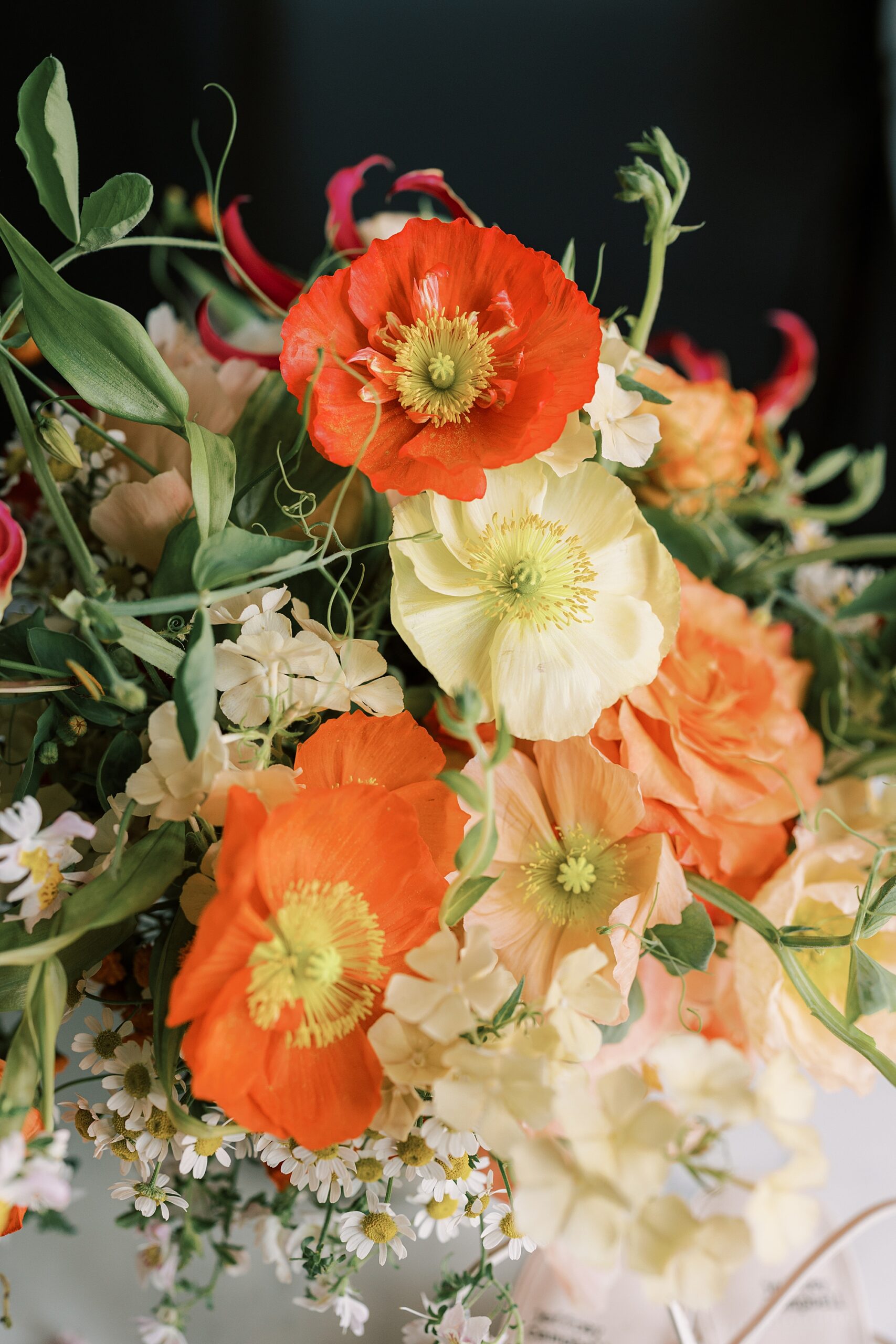 bright orange and yellow bouquet for summer wedding