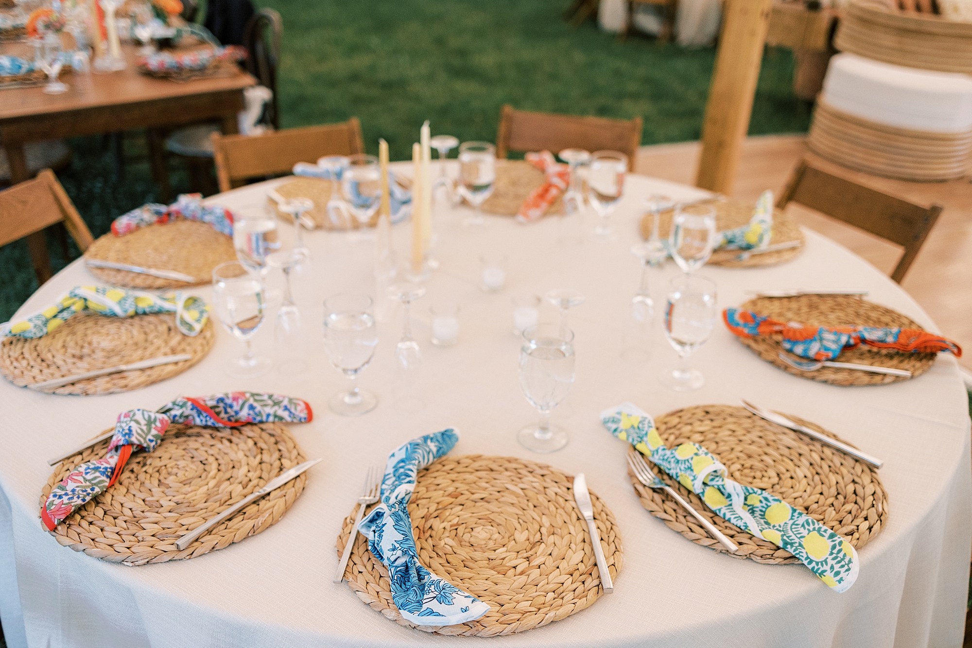 place setting with wicker place mat and flower napkins for reception at Bowman's Hill Wildflower Preserve