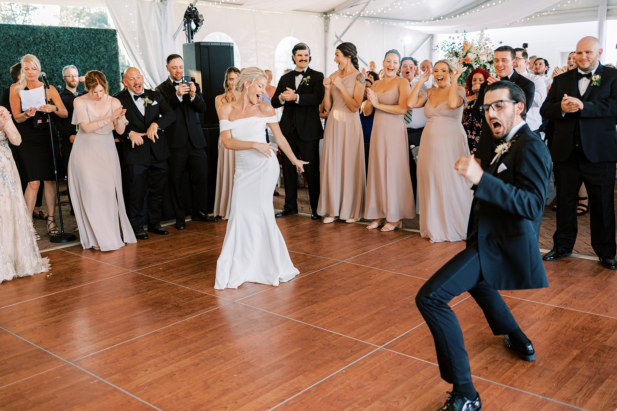 groom breaks out dance moves during wedding reception at Lauxmont Farms