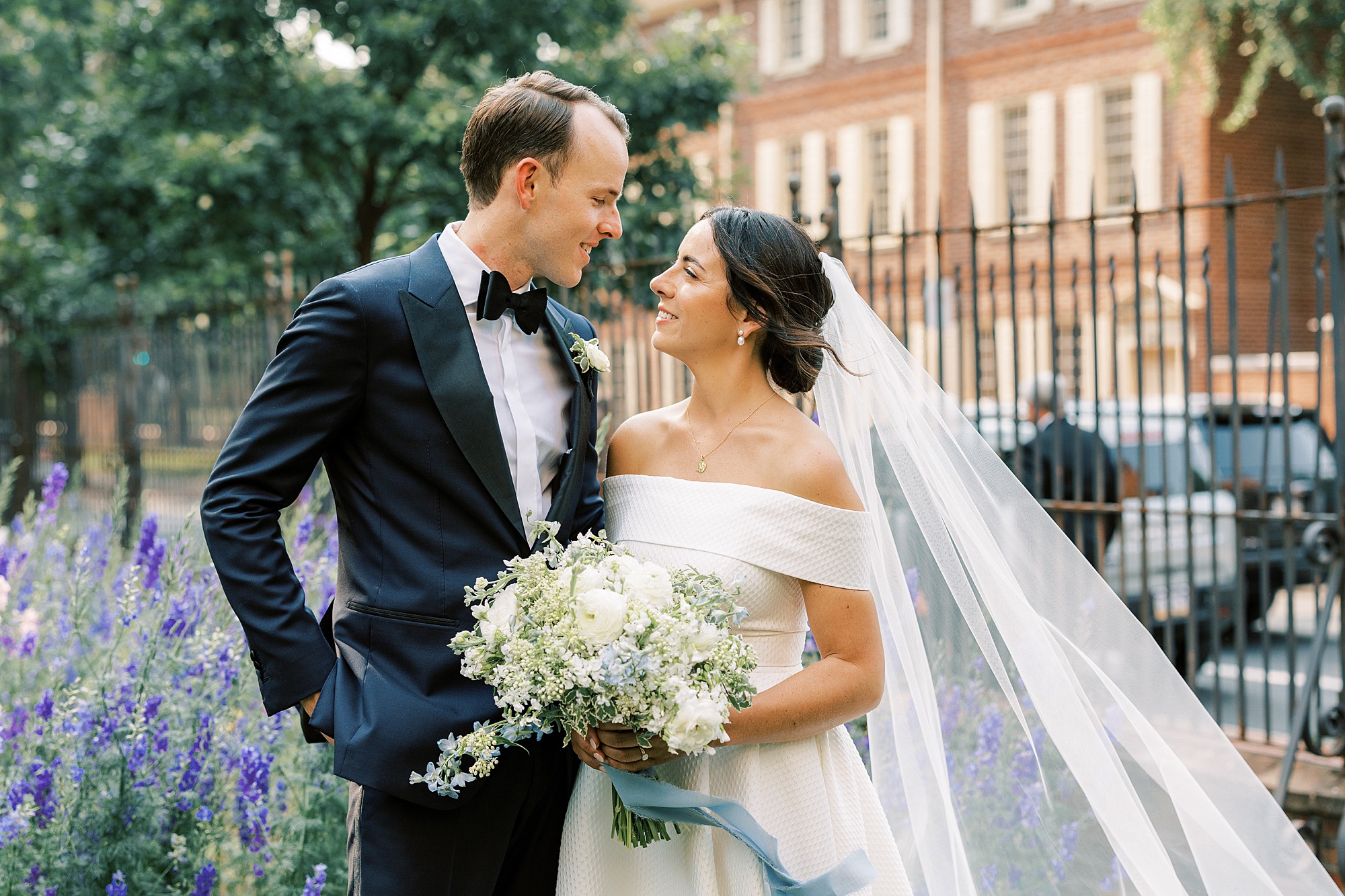 bride and groom gaze lovingly at each other during their Philadelphia wedding photo session