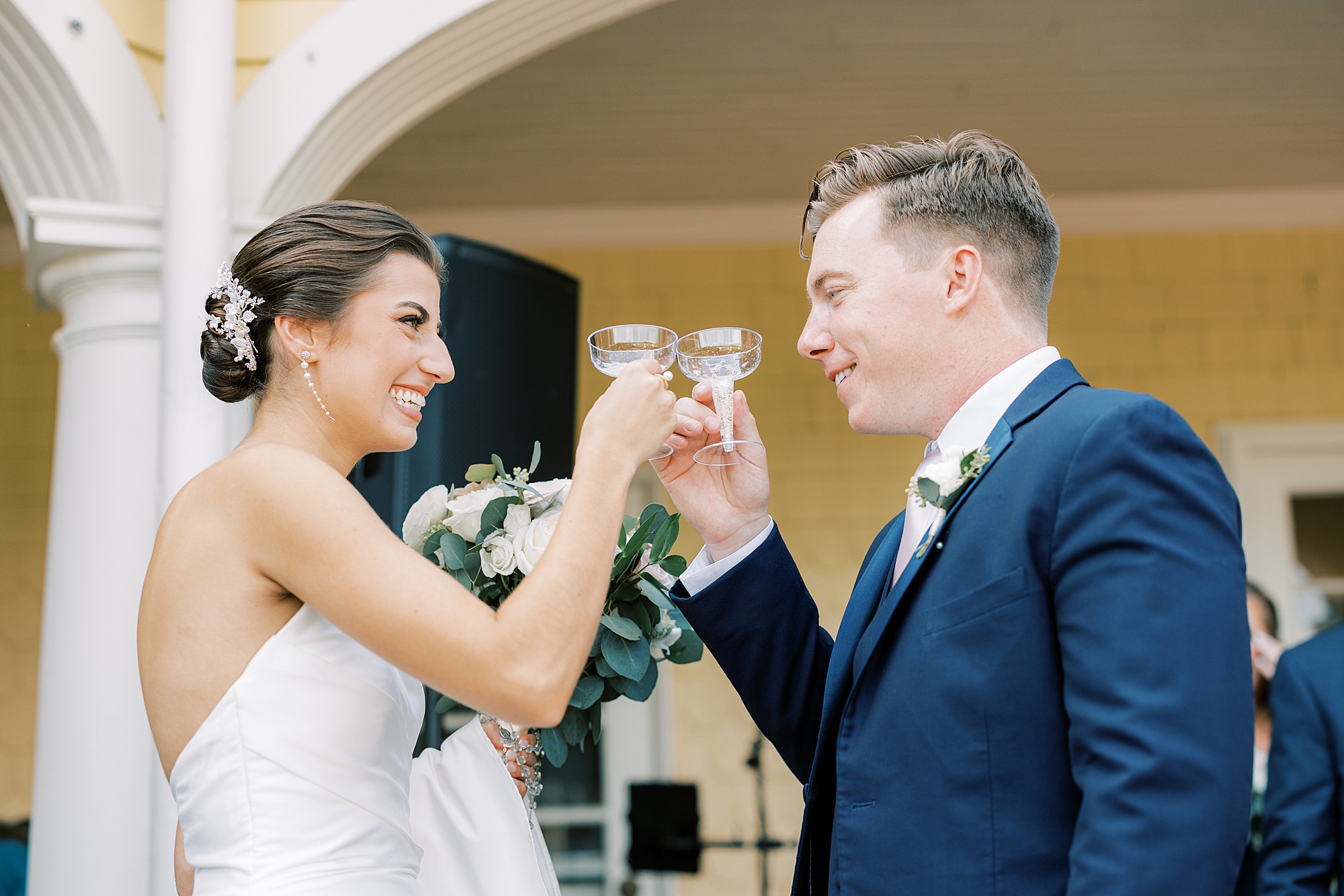 bride and groom toast with custom cocktails at the Philadelphia Cricket Club
