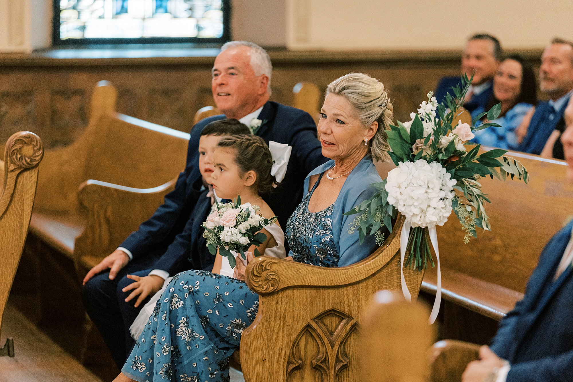 family watches traditional wedding ceremony at Philadelphia PA church