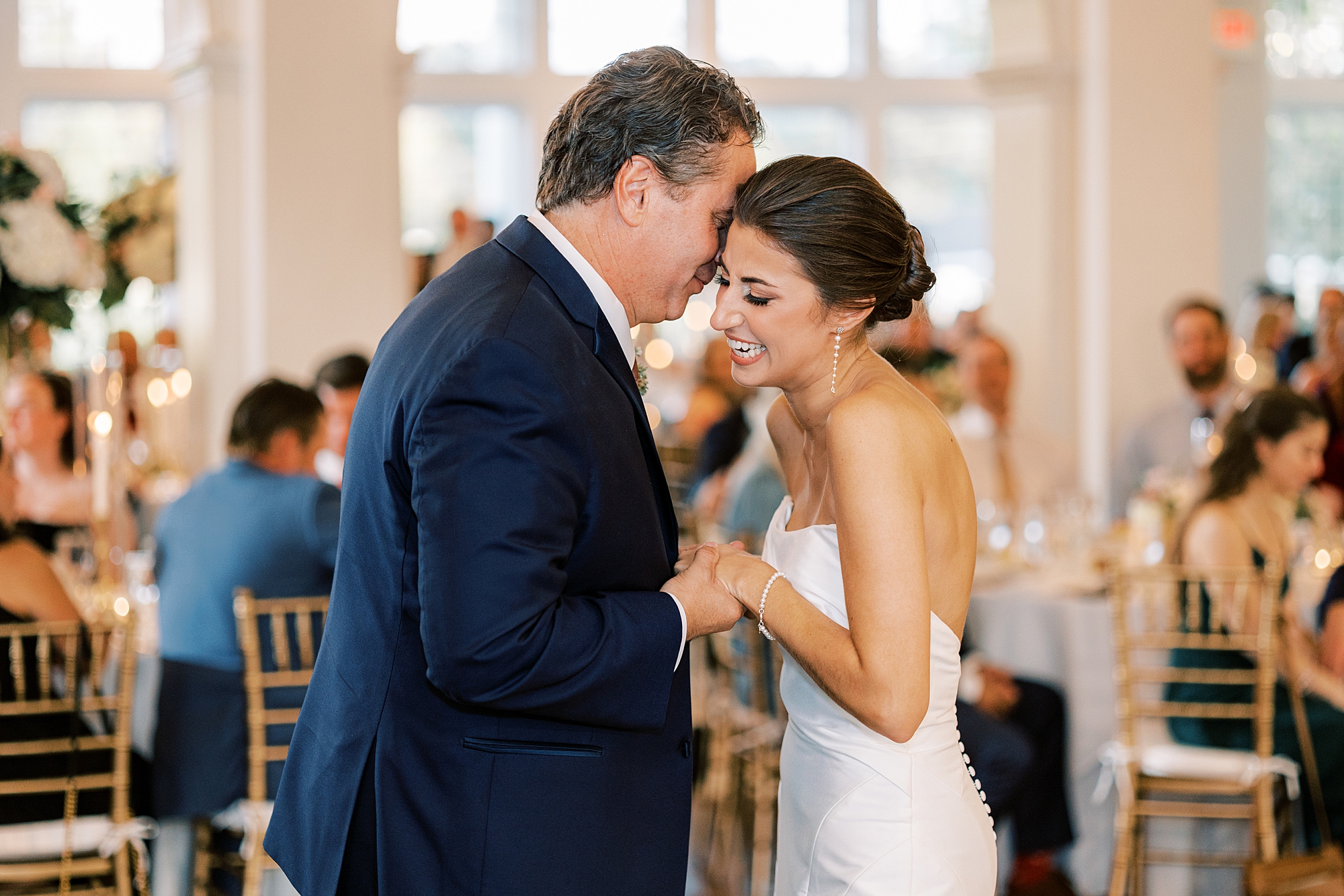 bride and dad laugh during dance at Philly reception 