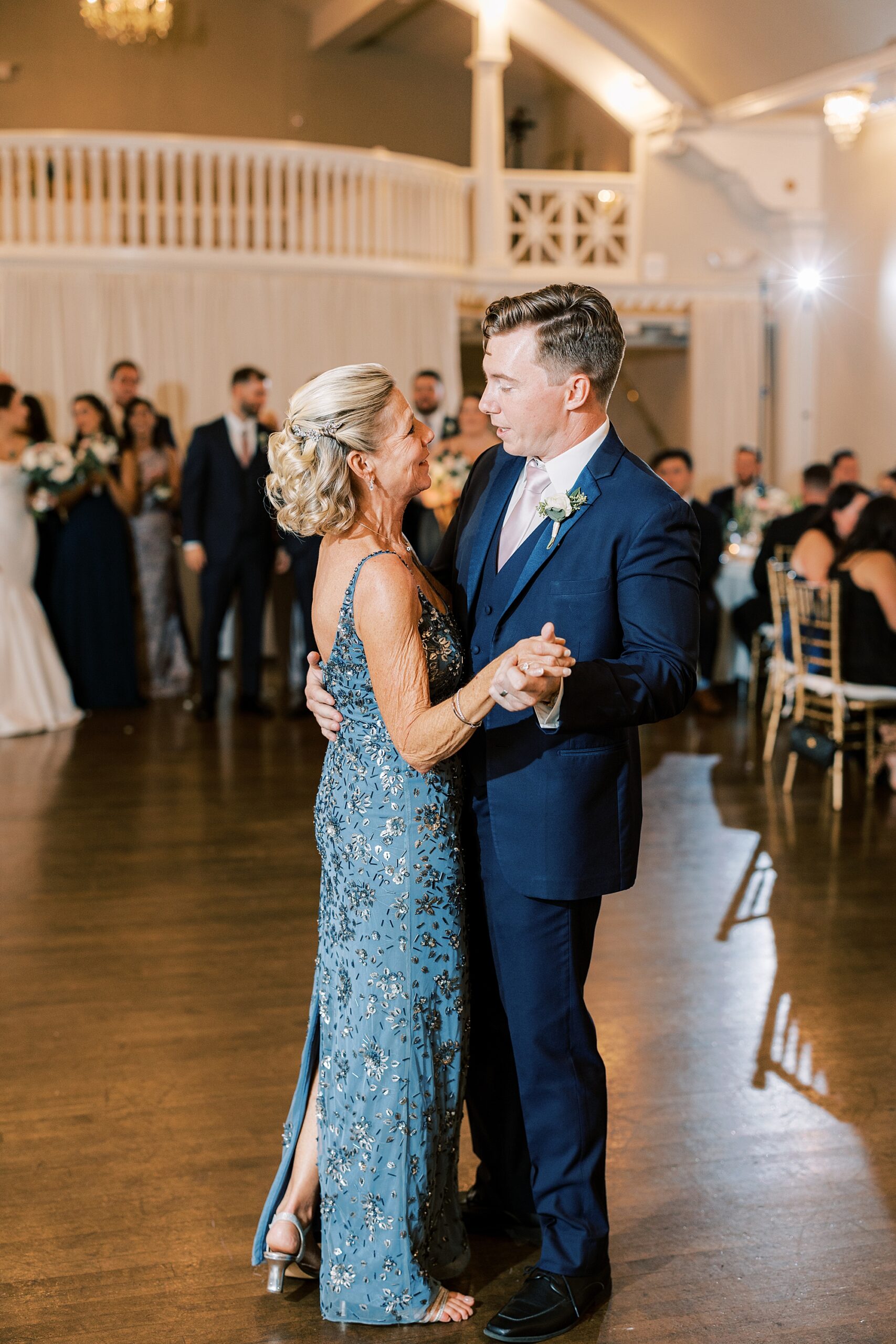 groom dances with mother during Philly PA wedding day