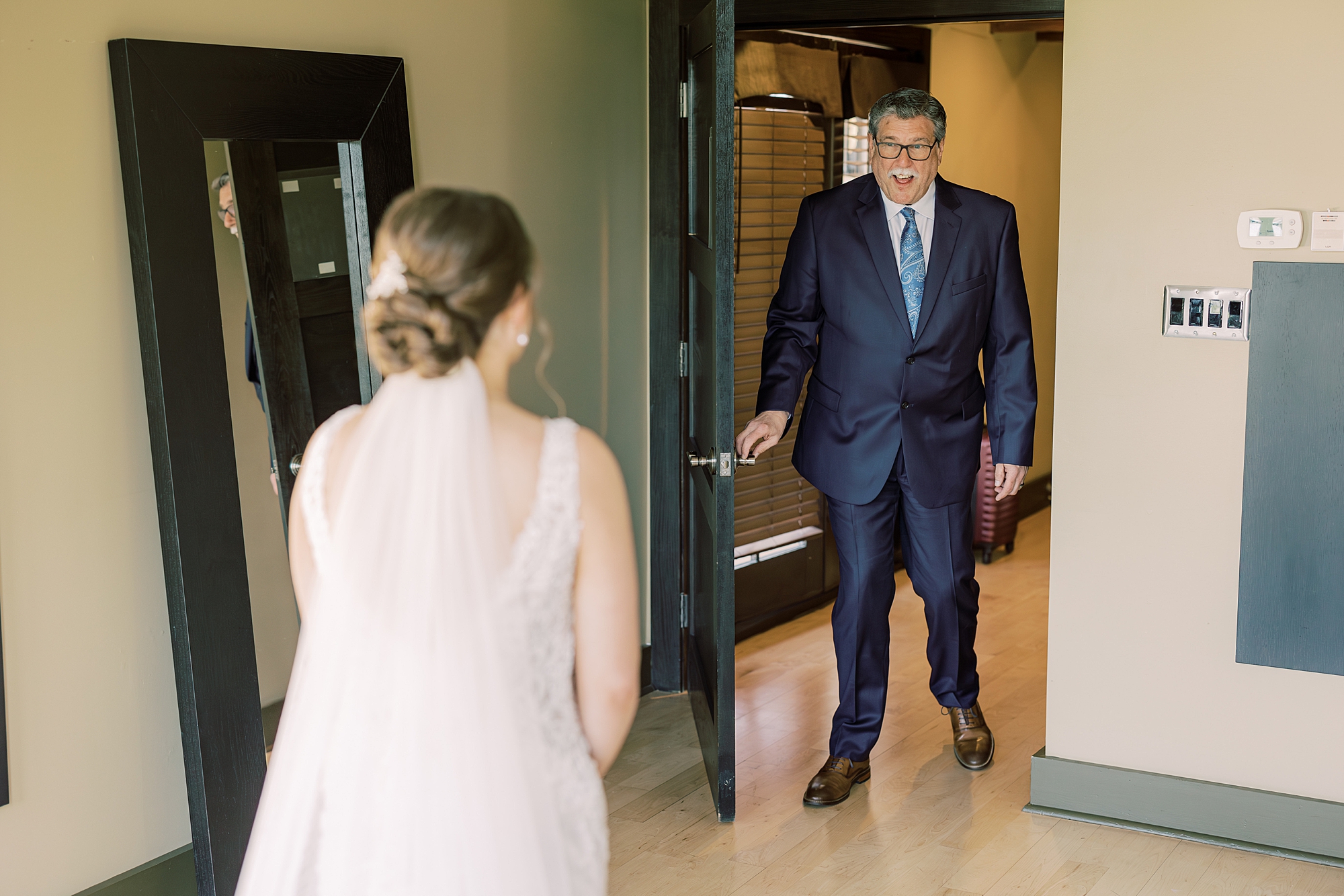 father walks into suite to see bride for first look