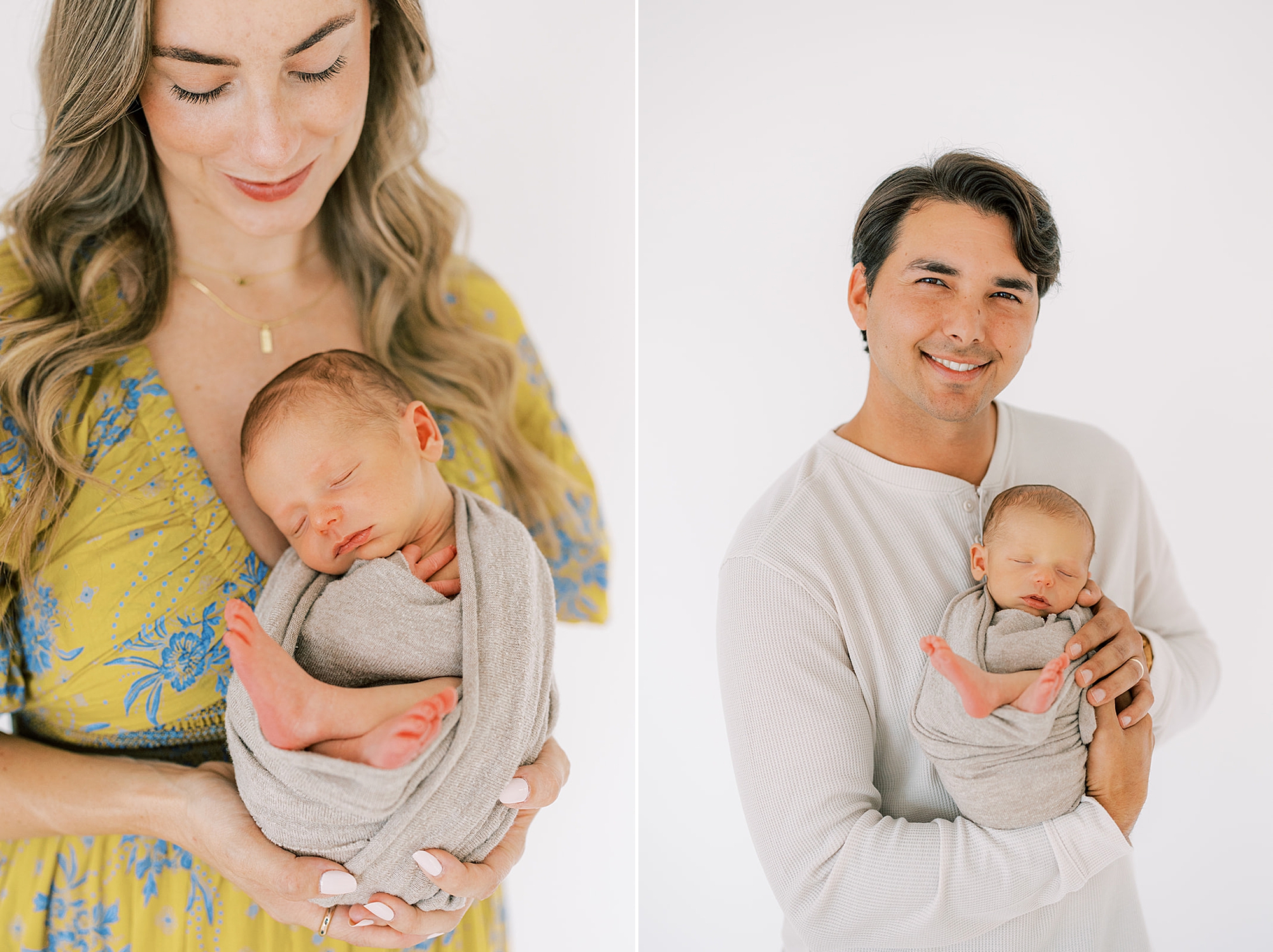 new parents hold baby in grey wrap during studio newborn photos in Media PA