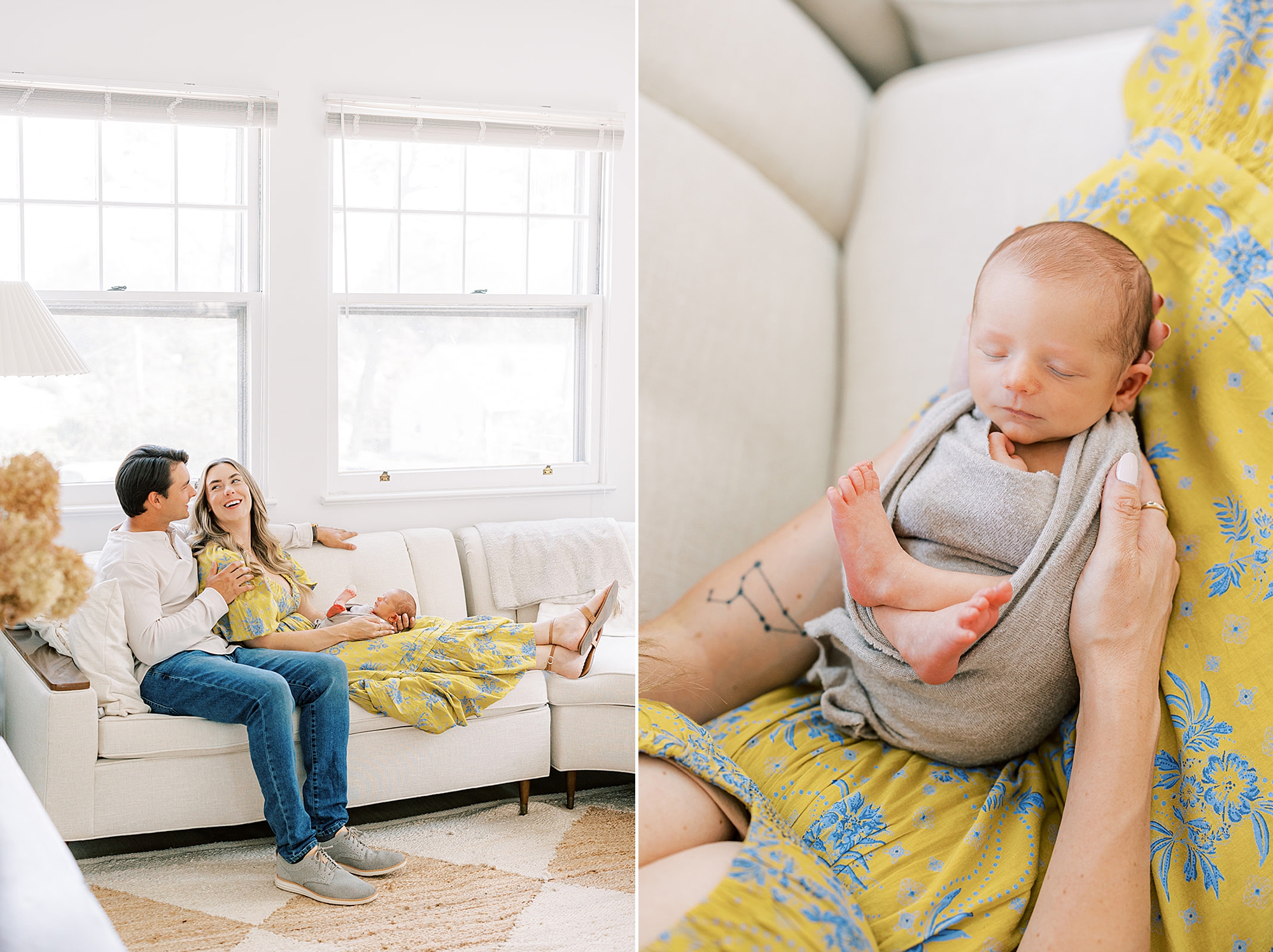 parents sit on couch holding son during studio newborn photos in Media PA