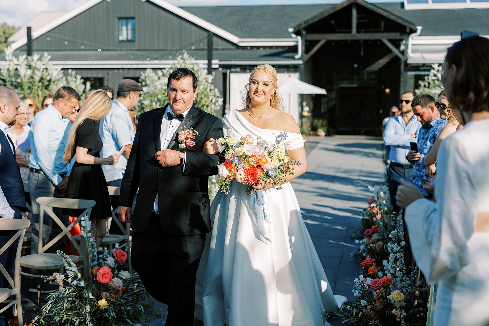 bride and father walk down aisle for wedding ceremony at Terrain DelVal