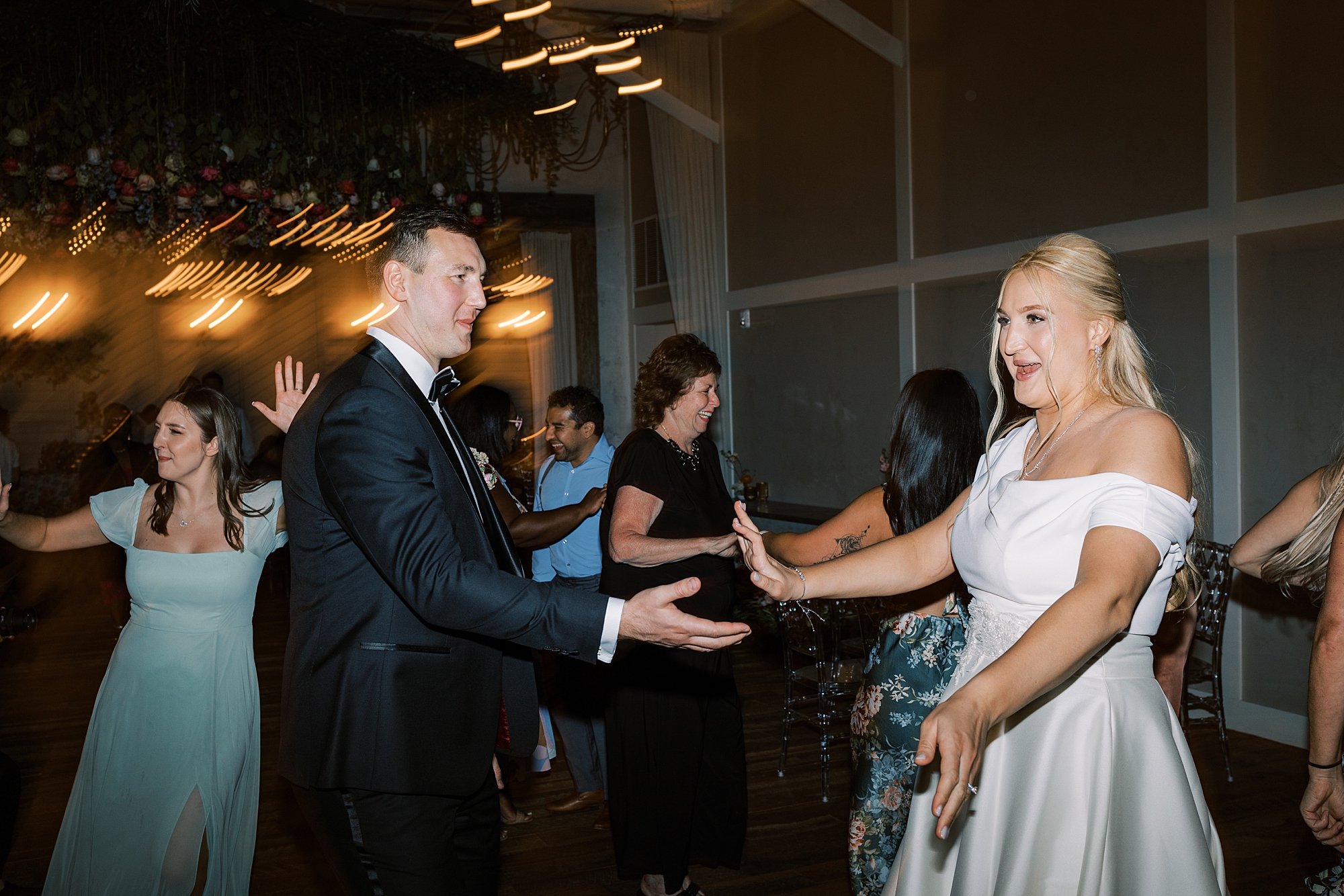 newlyweds dance during Terrain Gardens wedding reception