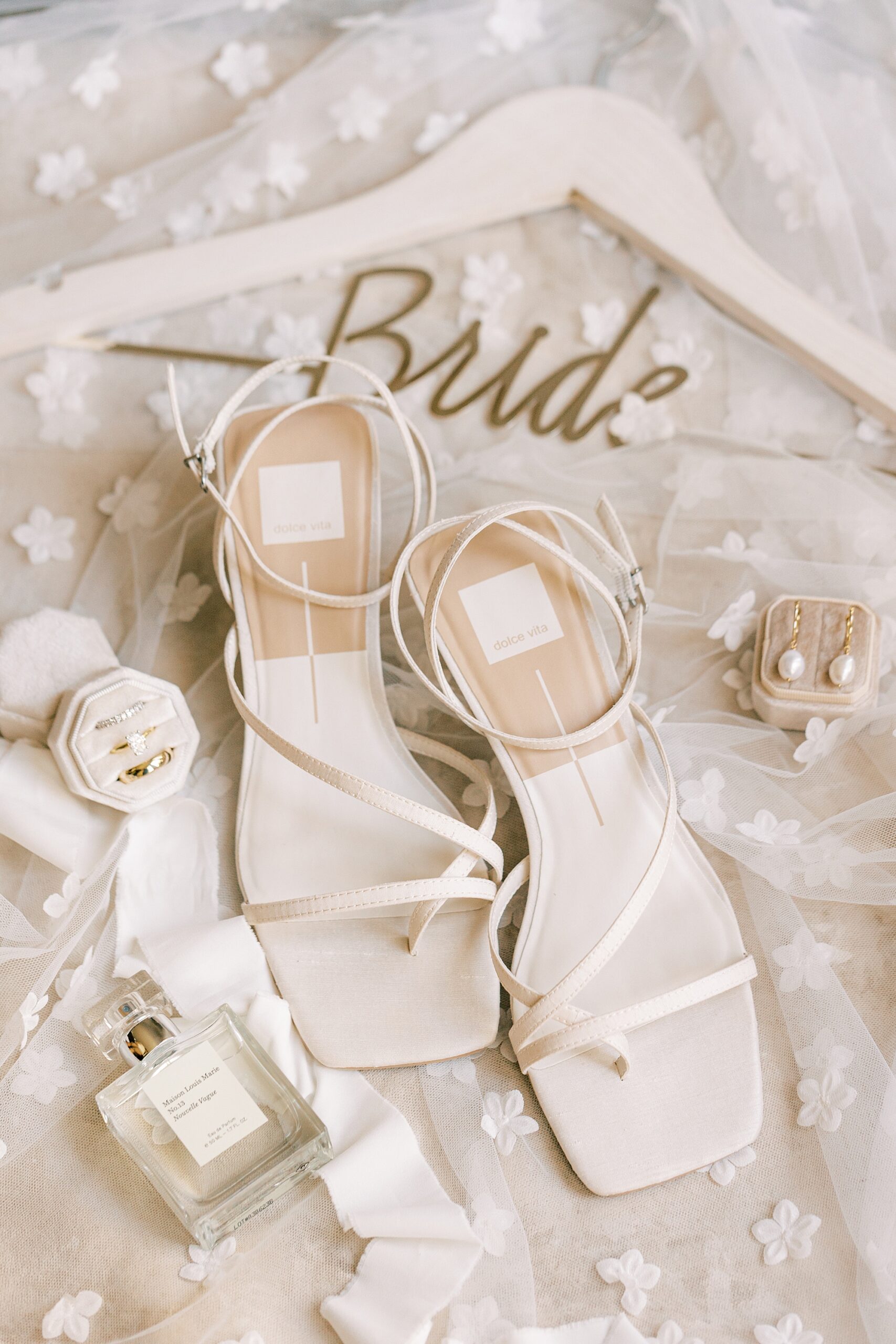 bride's shoes with custom hanger and ring boxes