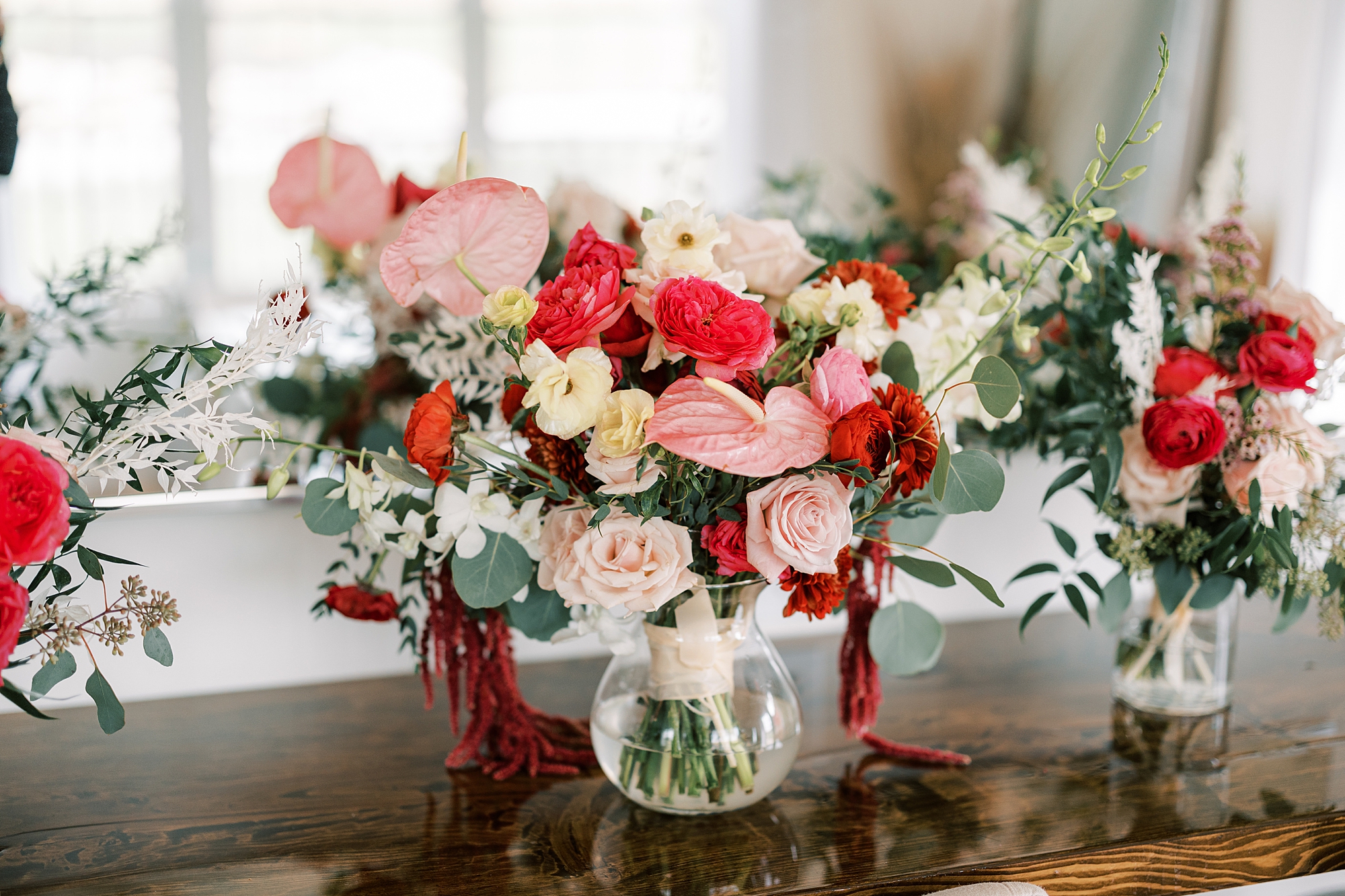 bouquet of pink, white, and bright pink flowers 