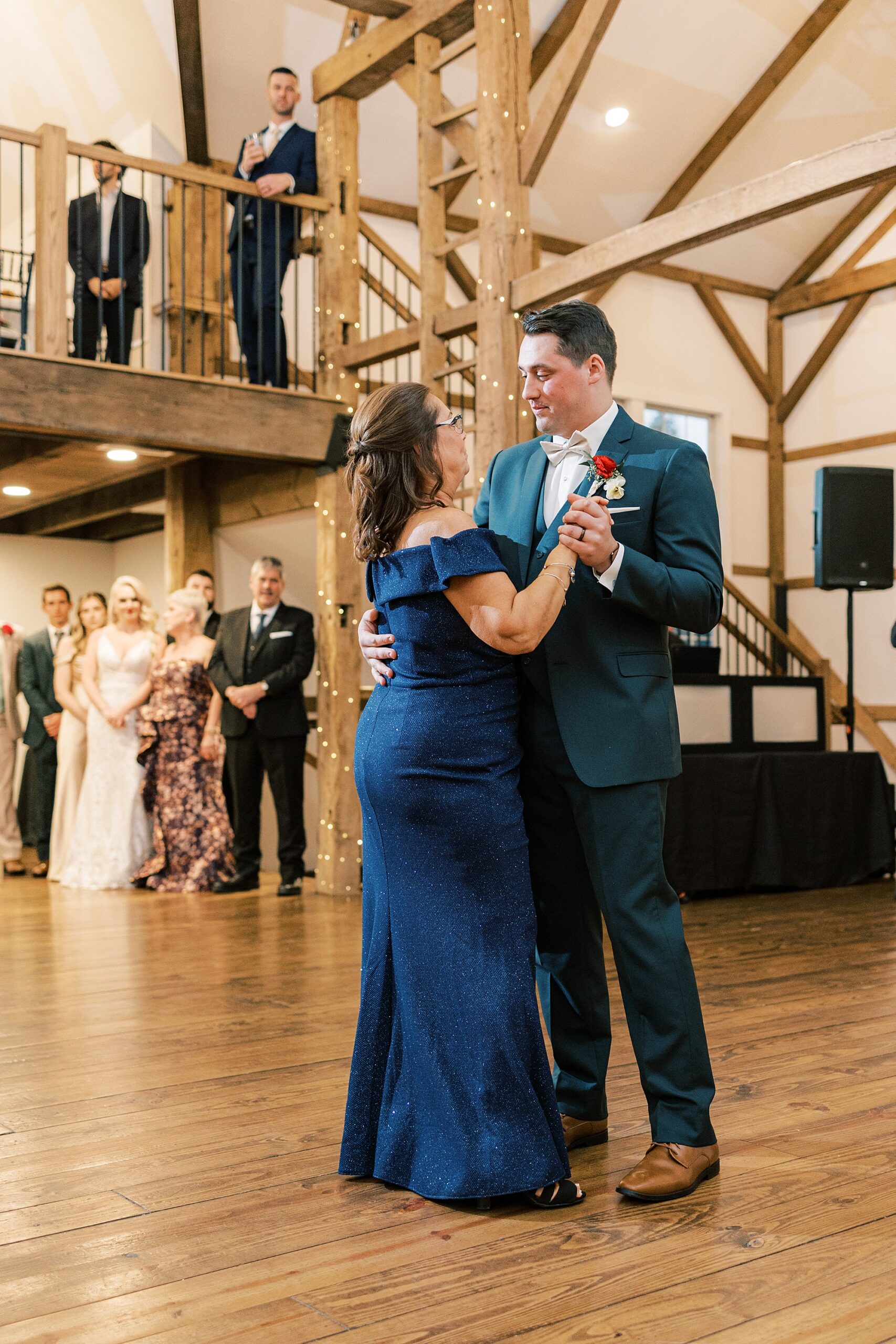 groom dances with mother during wedding reception at Osbornia Farm