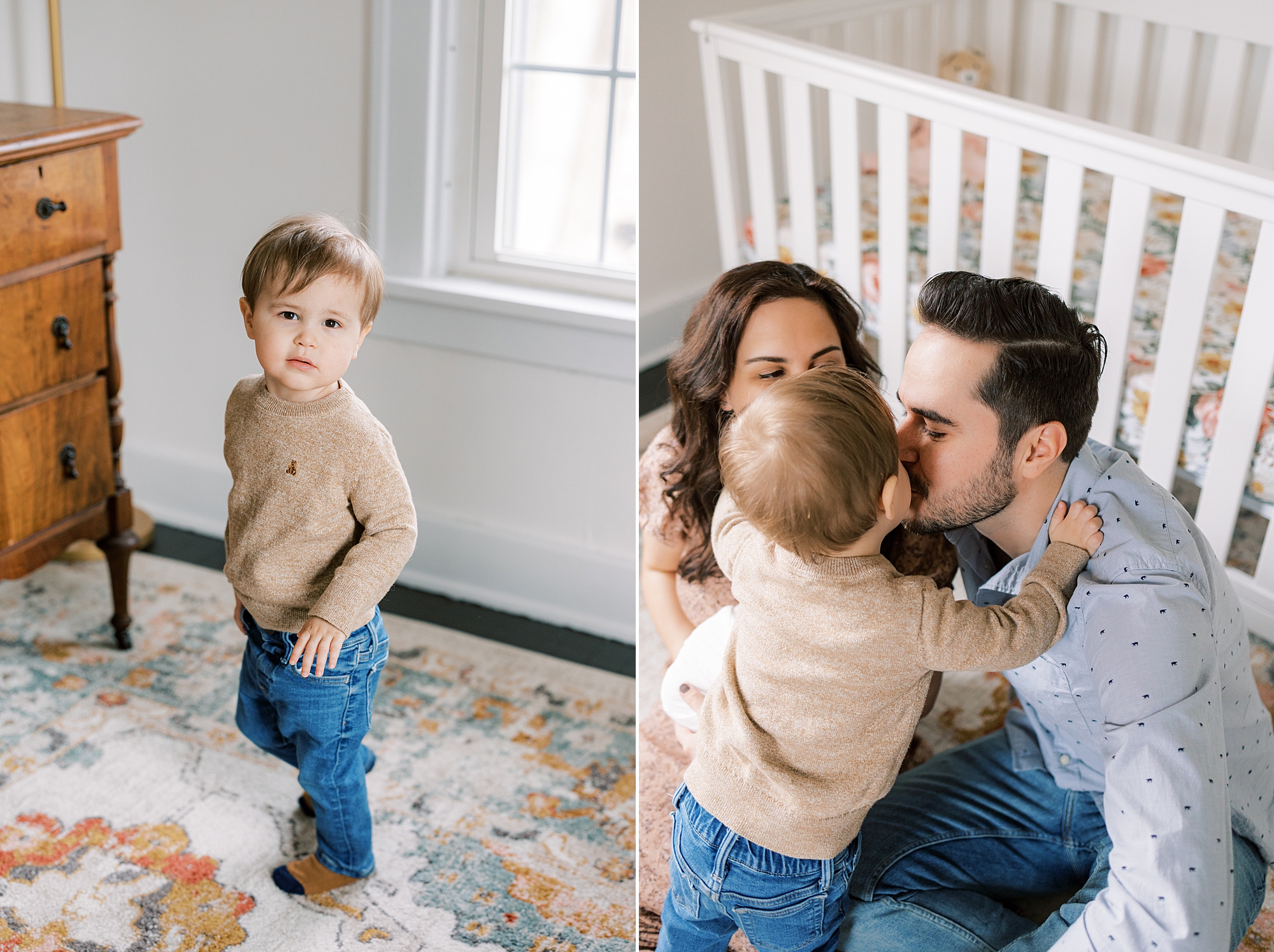 toddler son leans to kiss parents in front of crib during newborn portraits at home in Media PA