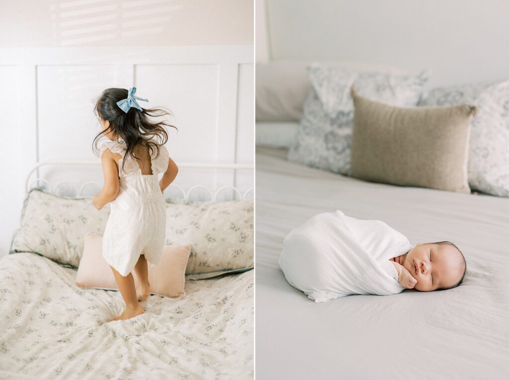 big sister jumps on bed with newborn son during a winter in home newborn session