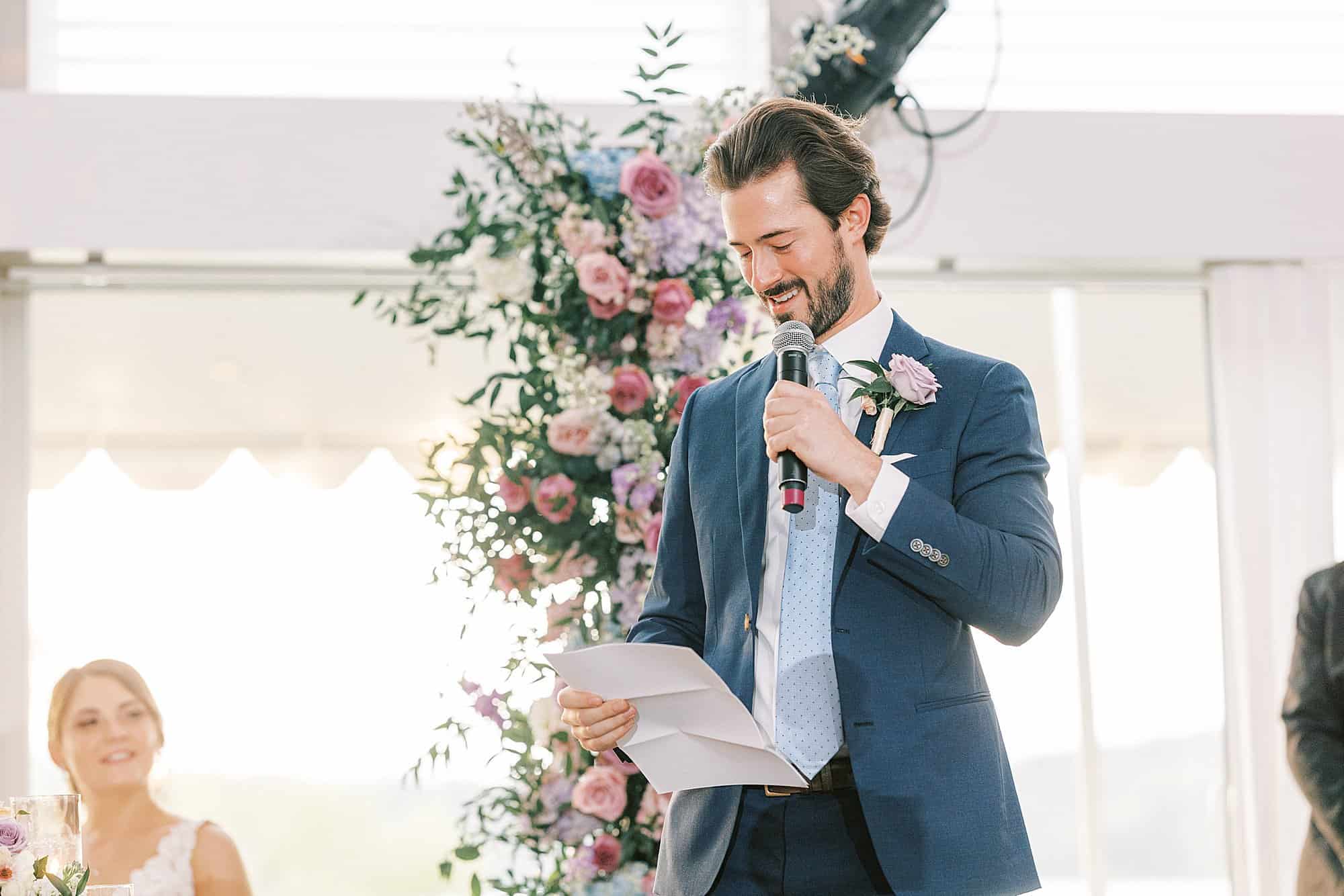 Best man gives a speech during a Lake House Inn wedding