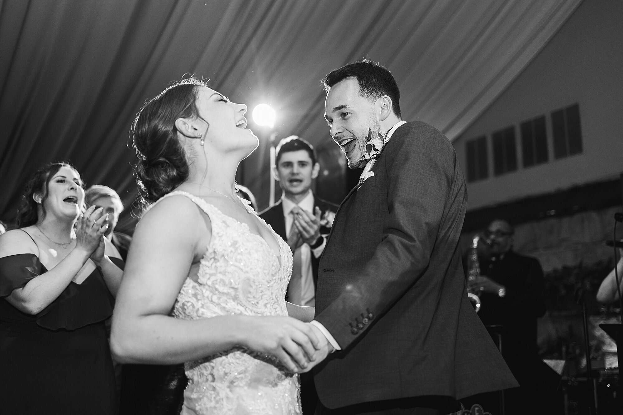 bride and groom kiss during their Perkasie PA wedding reception during their sparkler send off