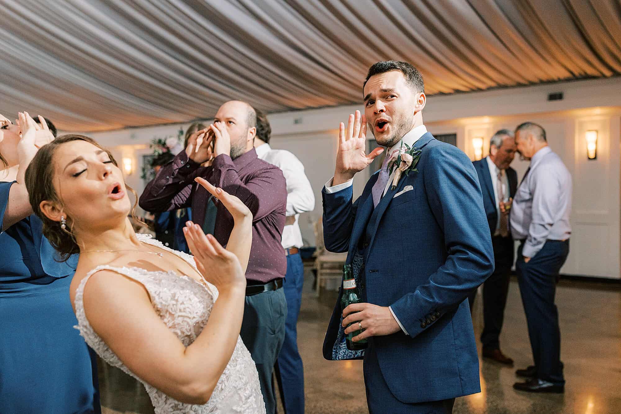 bride and groom kiss during their Perkasie PA wedding reception during their sparkler send off