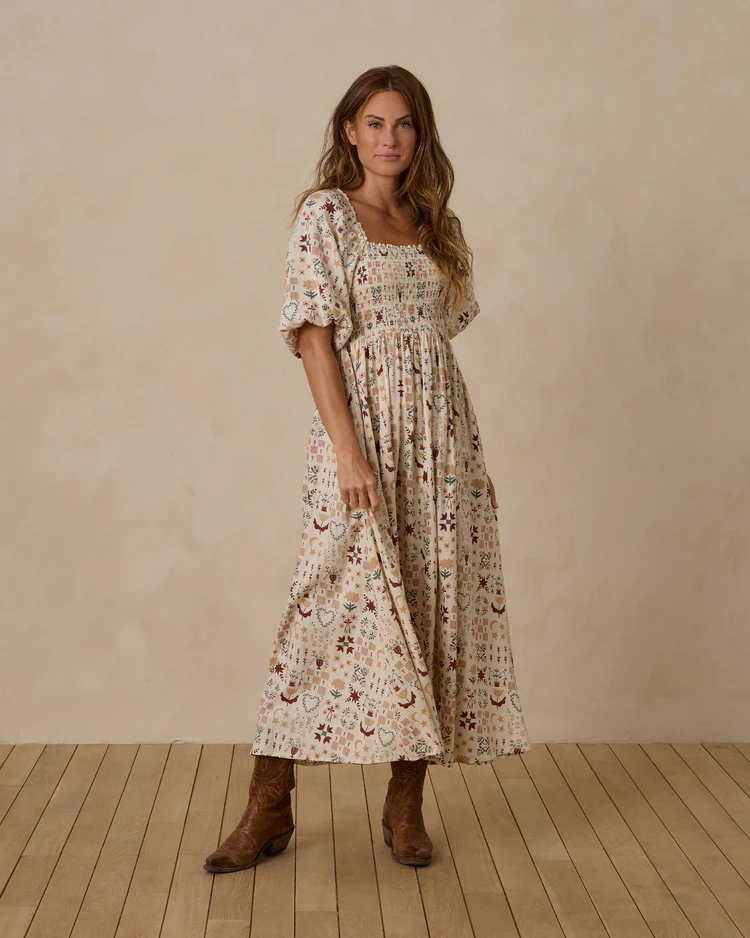 An image of a female  model from the Rylee and Cru website in one of their Fall 2024 patterned dresses perfect for a mothers Fall Family Photos Outfit