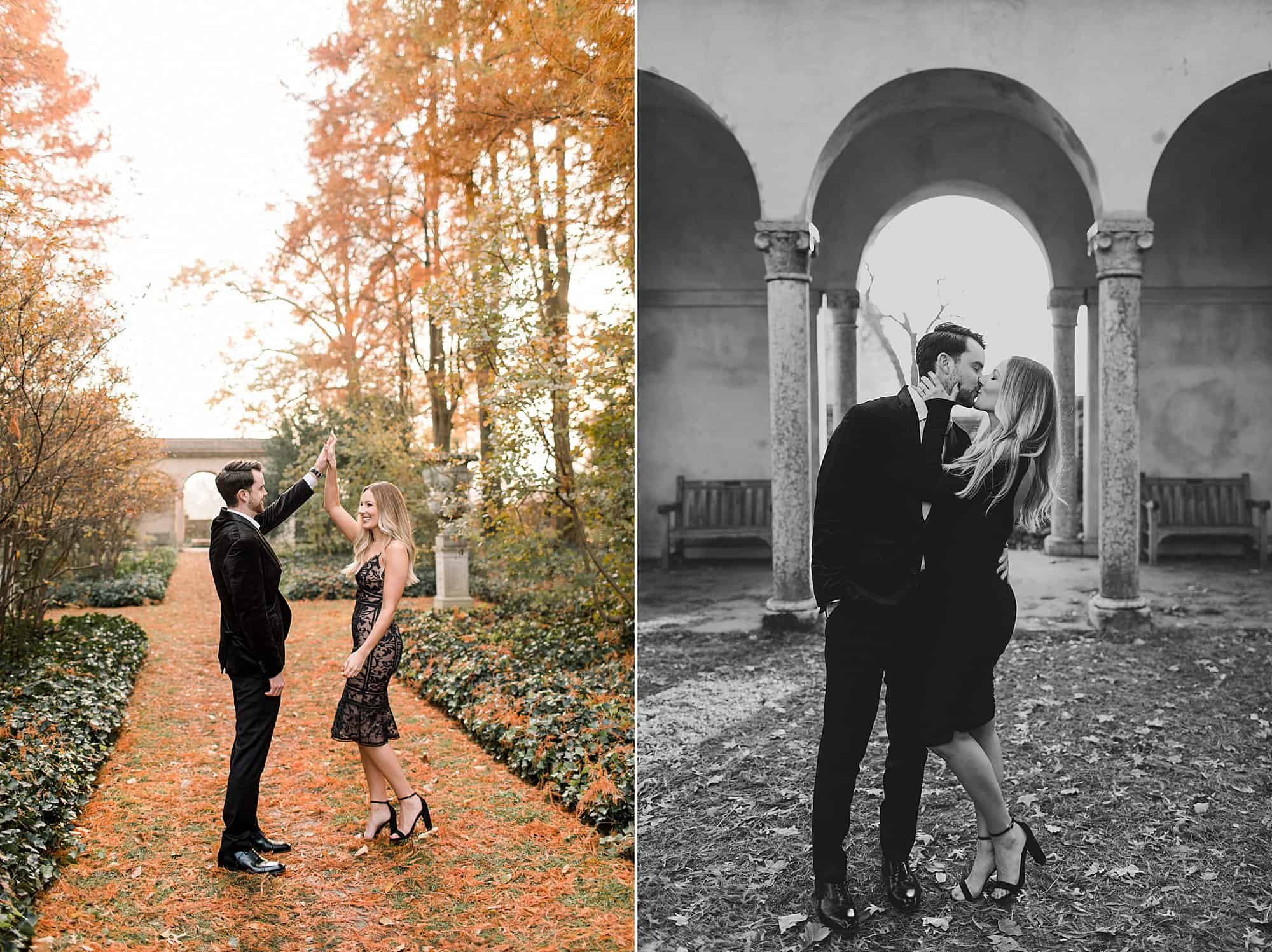 a sharply dressed man kisses his beautiful fiance with architectural arches behind him at Marian Coffin Gardens.  The arches look similar to those at Longwood Gardens