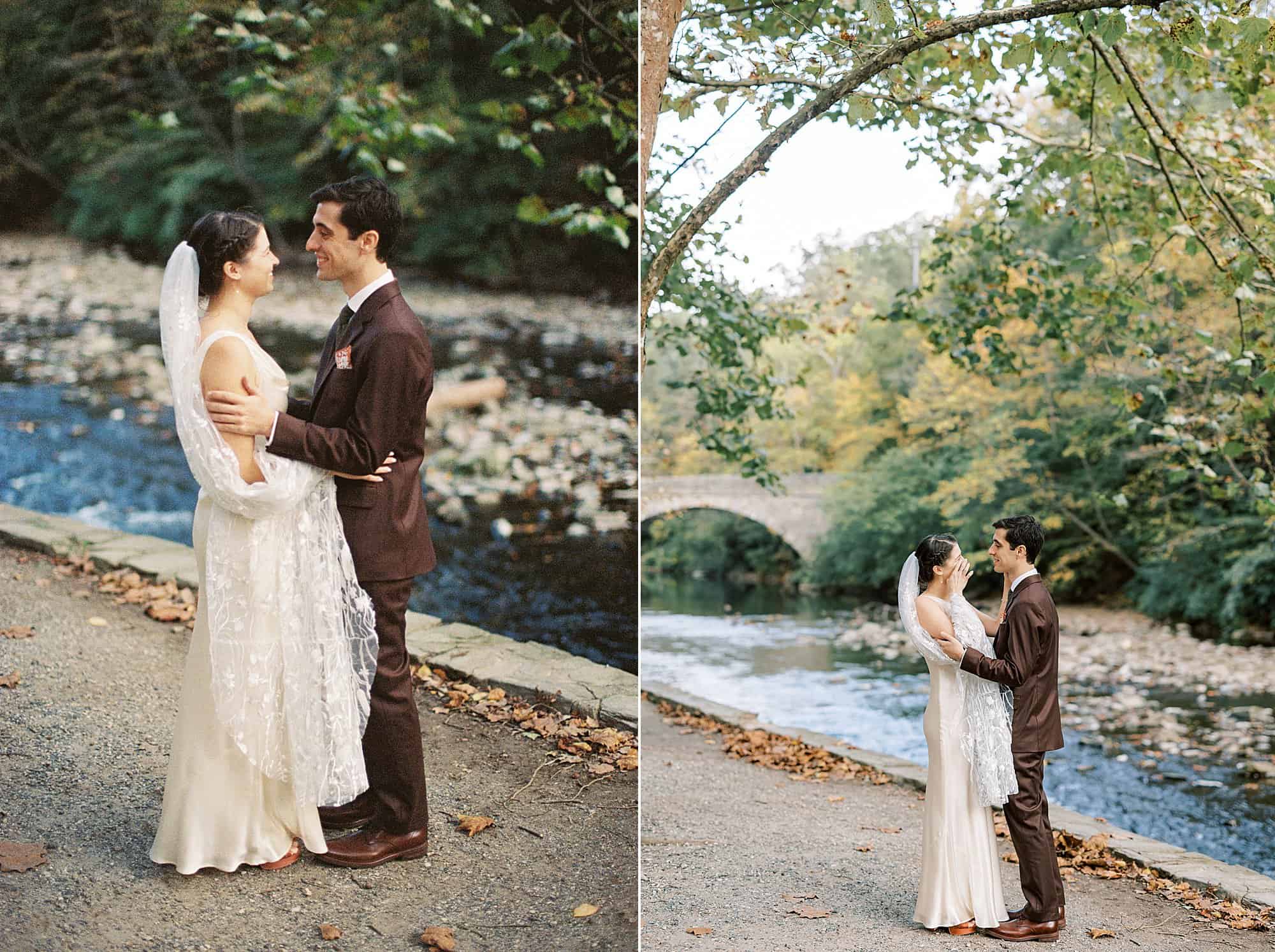 a 35mm film photography image of a bride and groom embracing each other next to a creek at their Valley Green Inn wedding