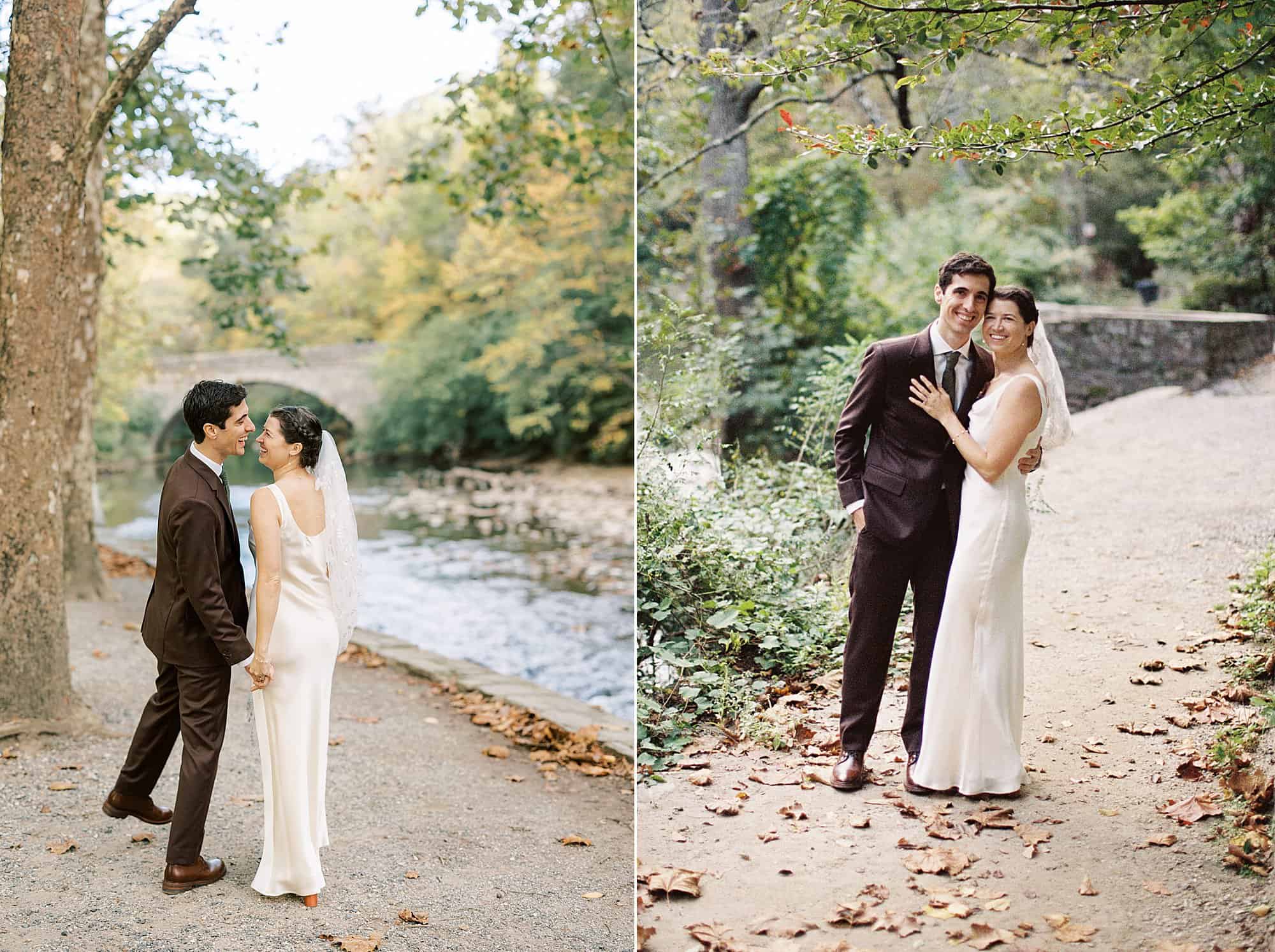 a bride and groom laugh at each other as they walk away with her groom on a gravel path at Valley Green Inn on their wedding day