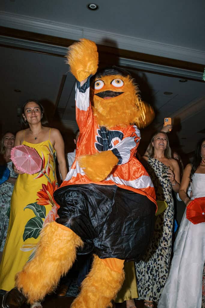 Gritty Philadelphia Flyers mascot surprise appearance on the dance floor at a Skytop Lodge wedding reception in Skytop, Pennsylvania