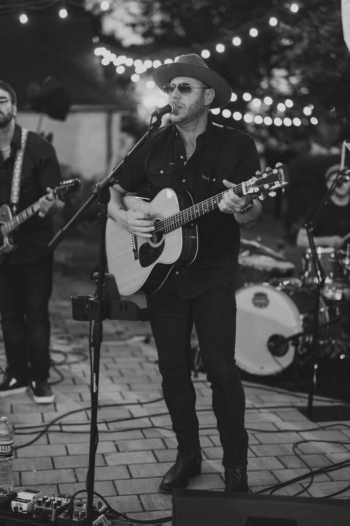 Black and white photo of Matt Freedman and The Herd performing live at Drumore Estate summer wedding reception in Lancaster PA