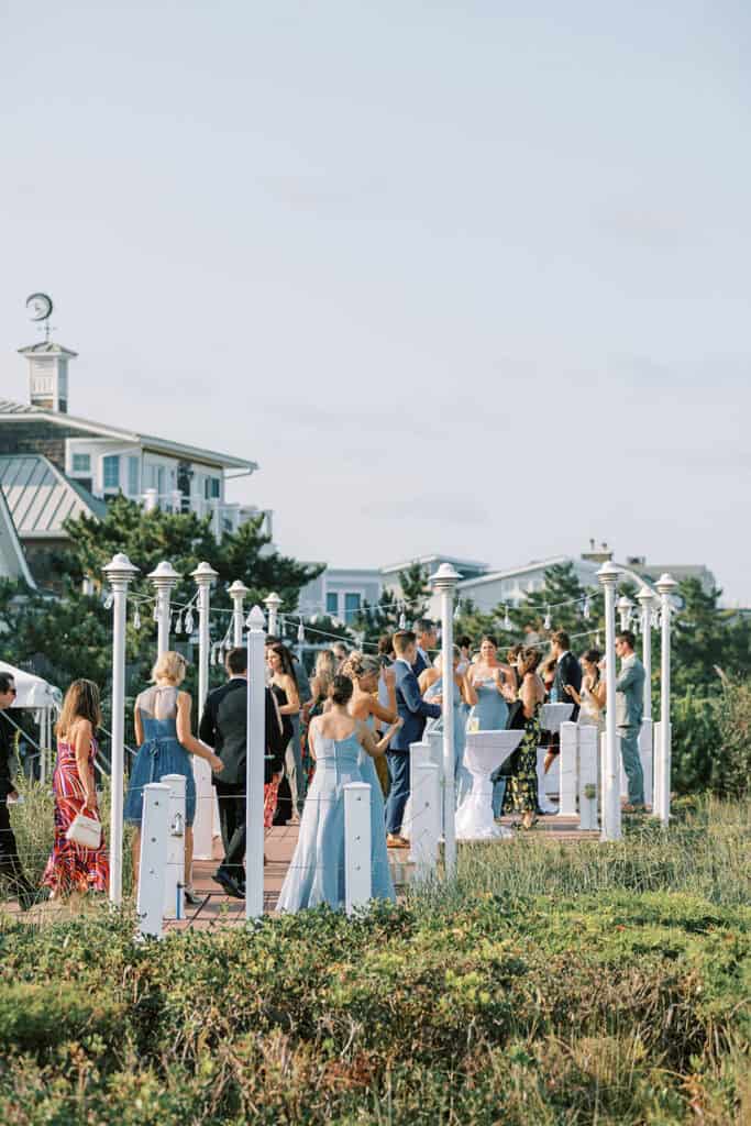 Outdoor cocktail hour on the boardwalk deck at Henlopen Acres Beach Club, Rehoboth Beach Delaware wedding, Samantha Jay Photo