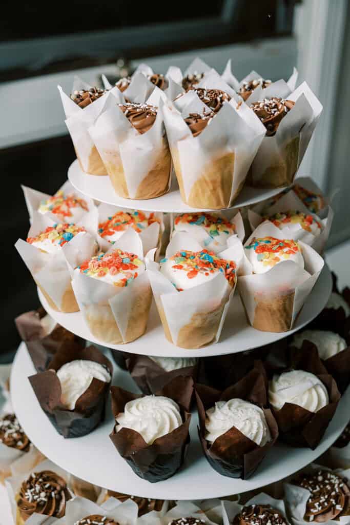 Wedding cupcake tower with assorted flavors at Rehoboth Beach Delaware wedding reception, Henlopen Acres Beach Club