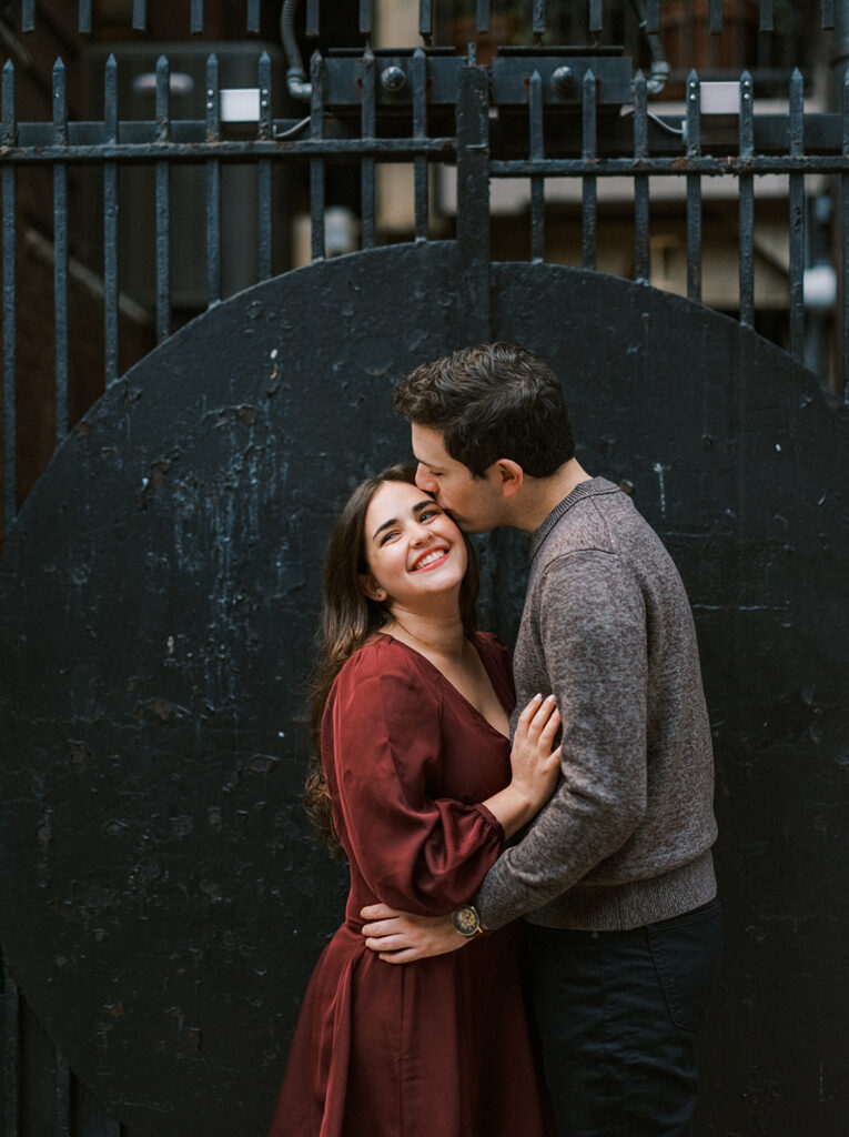 Couple sharing a slow dance moment during their fall engagement photos in Philadelphia